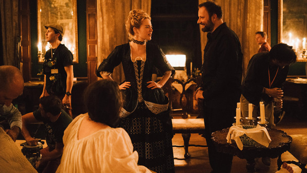 Emma Stone and Director Yorgos Lanthimos on the set of THE FAVOURITE. Photo by Atsushi Nishijima. © 2018 Twentieth Century Fox Film Corporation All Rights Reserved